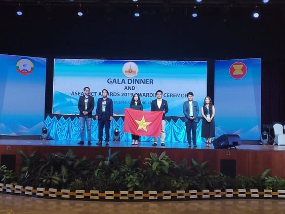 Representatives from HOCMAI on stage being honored at the ASEAN ICT Awards gala dinner