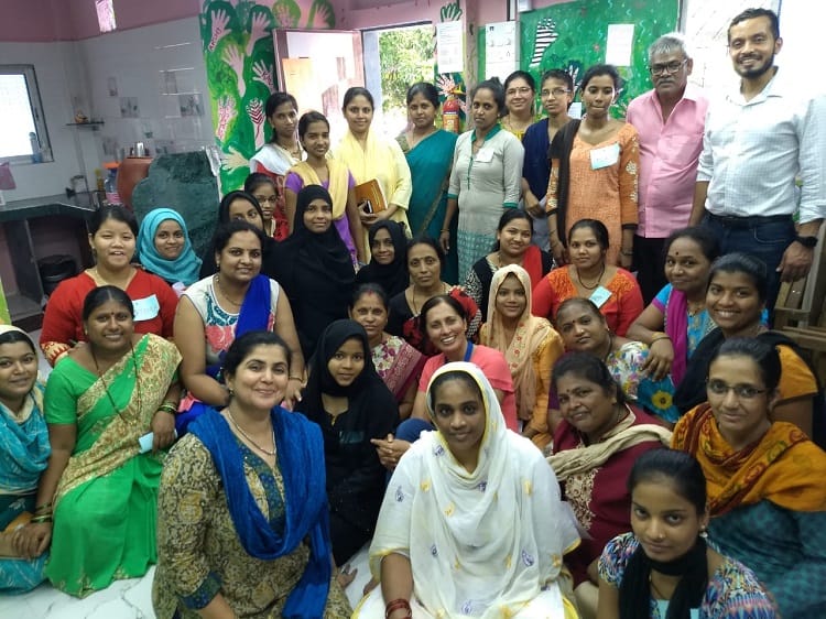 Global Fellow Yaser with ACT team and beneficiaries in Mumbai