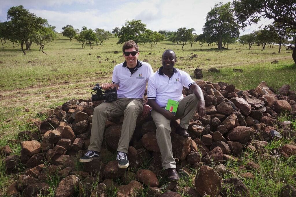Tommy and FAE Founder Samwel Mfanga in Kisima Cha Mungu, a rural Masai community south of Arusha, Tanzania.