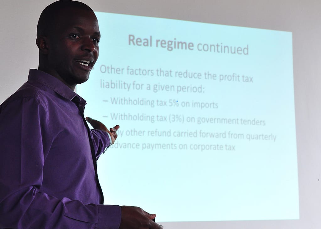 Osman Senyonjo, a business development associate and taxation expert gives a training to Rwanda entrepreneurs at AEC's offices in Kigali. 