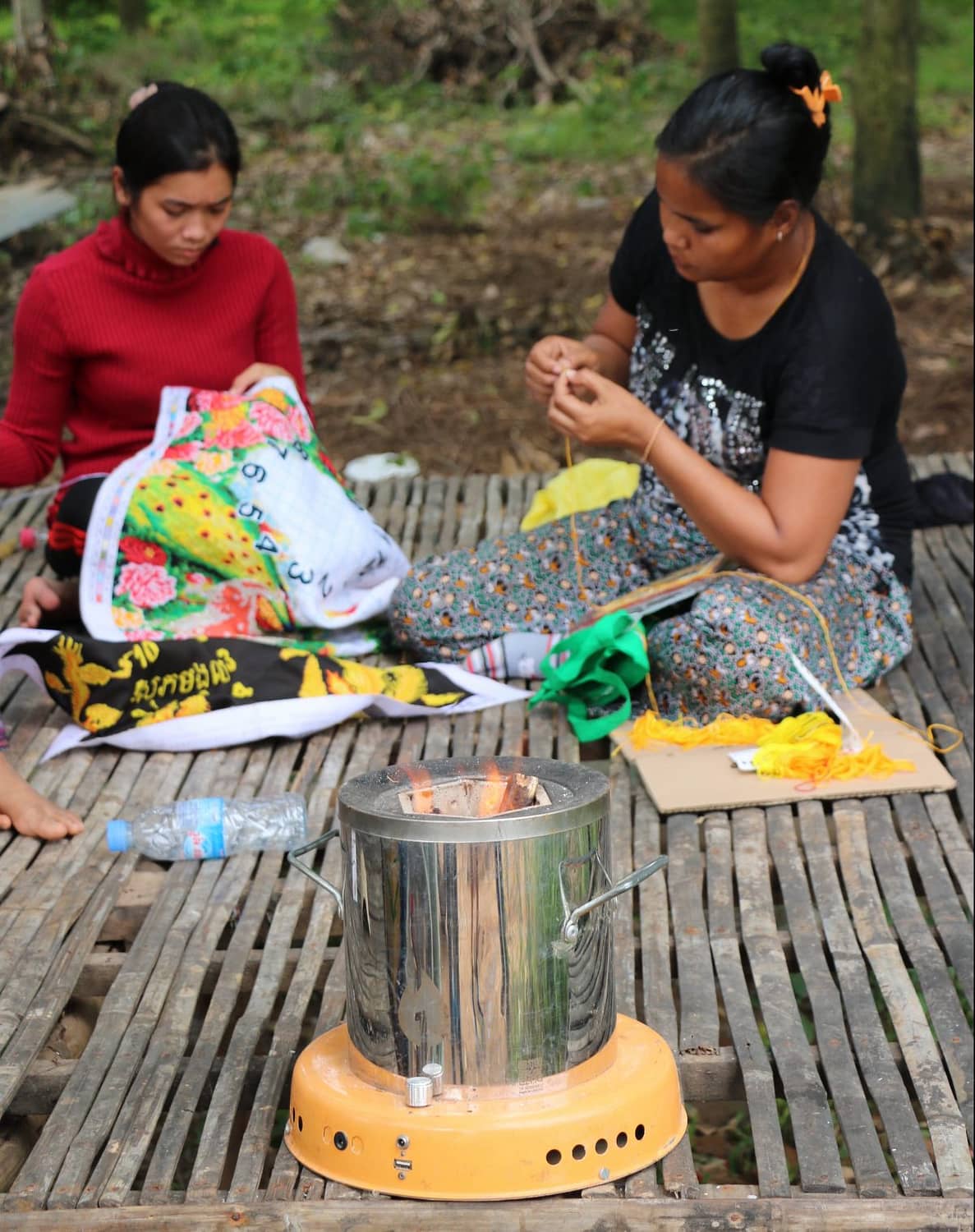 Local women with the ACE cookstove.