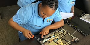 woman working with technology in a global leading light initiatives training