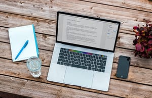 resume writing on a laptop