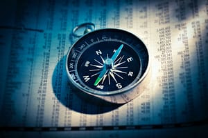 compass on newspaper