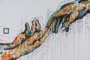 hands reaching out to each other mural