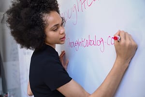 woman at whiteboard