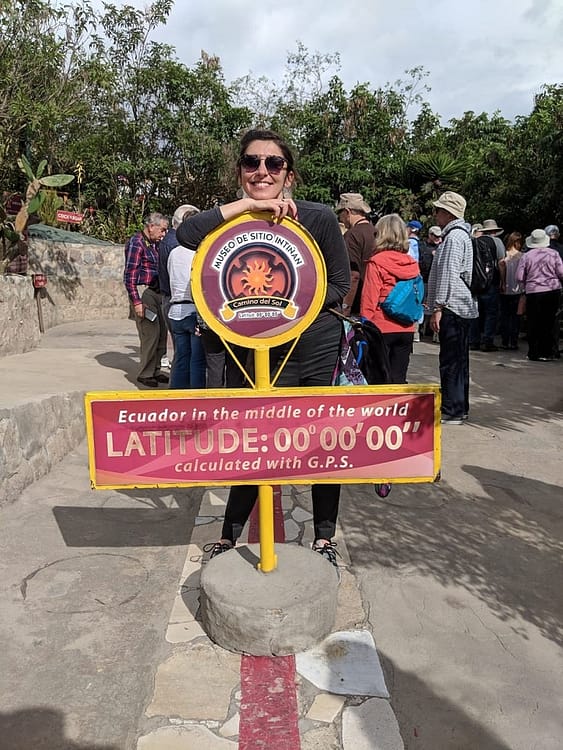 Andreia visiting the middle of the world in Ecuador