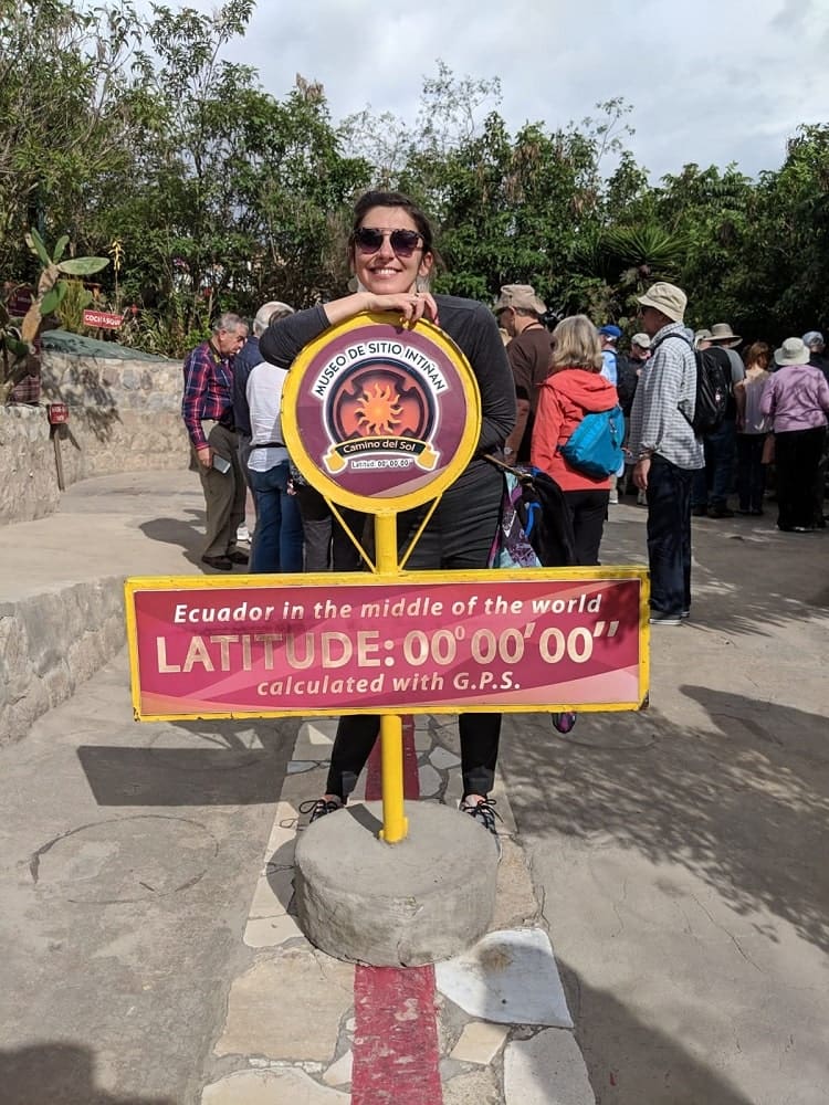 Andreia visiting the middle of the world in Ecuador